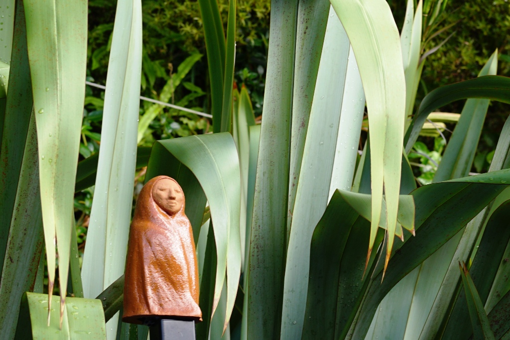 AllFlax by Wendy Naepflin - clay figure with flax